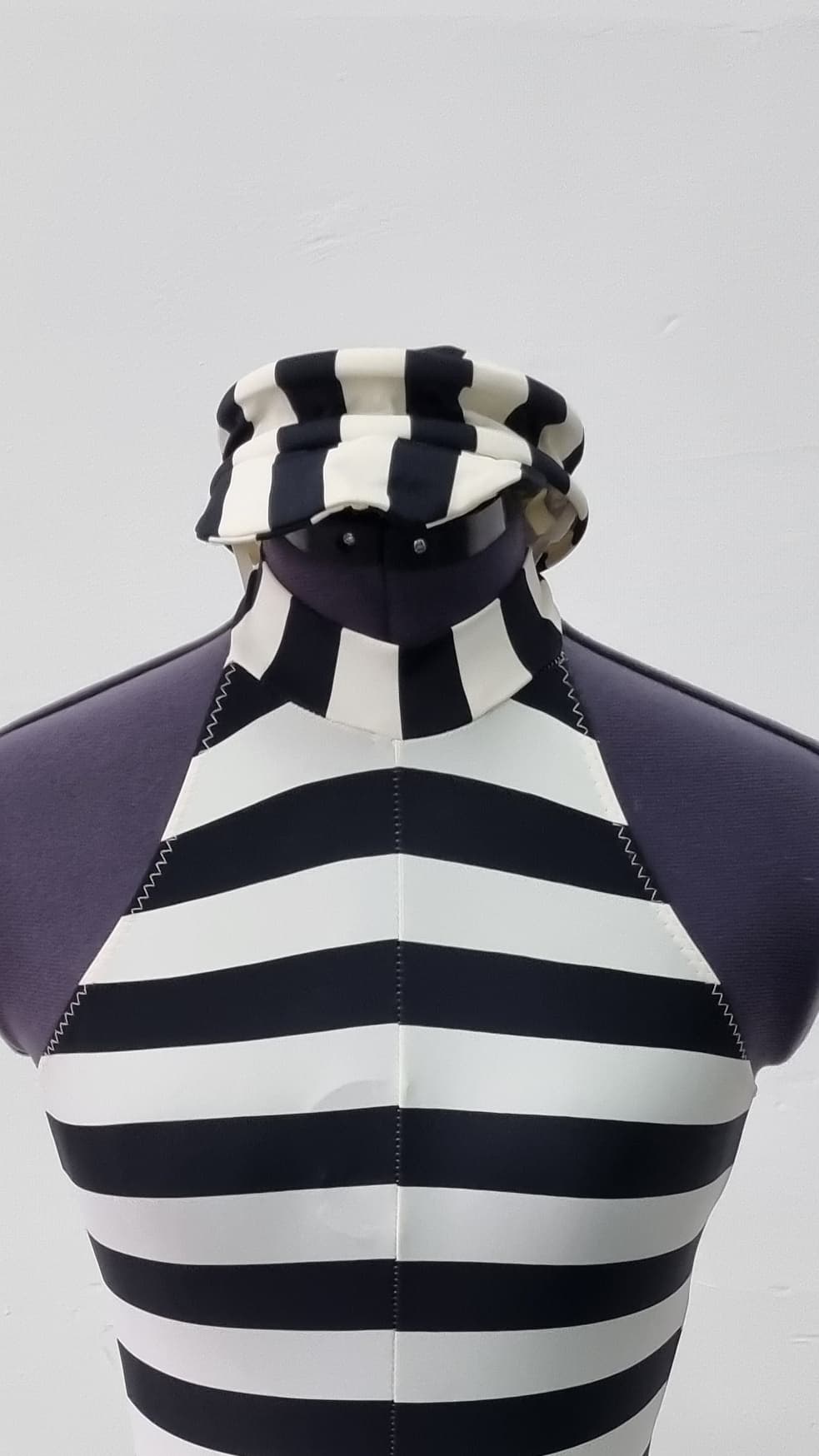 Circular Black and White Striped Hat - Image 1
