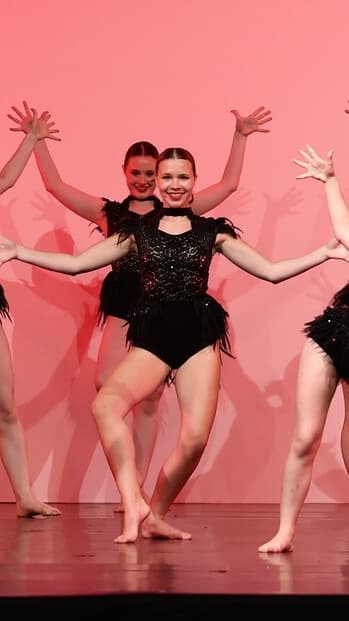 1st Position Black Feather Unitard - Image 1